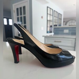 Christian Louboutin Black Peep-Toe Heels with Red Sole
